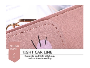 Detail of pink lychee leather texture and precise reinforced stitching on a mini bag