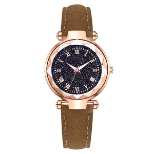 Starry sky dial watch with rose gold case, roman numerals and brown leather strap