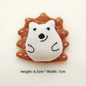 Detailed view of hedgehog embroidered patch with dimensions 6.5cm height and 7cm width