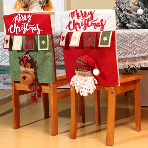 Detailed close-up of velvet Christmas chair covers featuring 3D Santa and Reindeer designs
