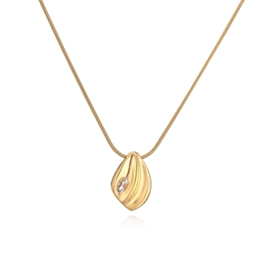Macro shot of gold-plated teardrop pendant with zircon on a sleek snake chain necklace