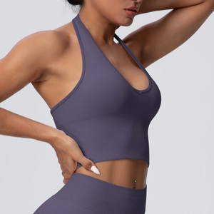 Detail view of purple ribbed seamless sports bra and high waisted yoga leggings set