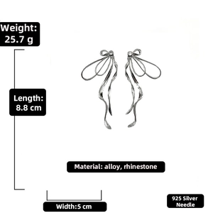 Silver bow ribbon earrings with rhinestones measuring 8.8cm in length and 5cm in width