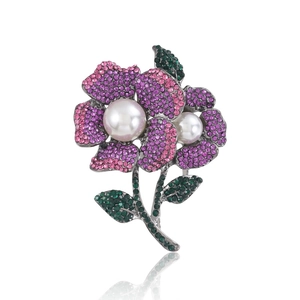 Elegant rose brooch with gradient pink rhinestones, white pearls and green crystal leaves