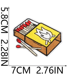 Detailed embroidery patch of a matchbox for camping gear with size labels