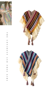 Close-up of bohemian knit shawl detailing colorful stripes, wavy textures, and fringe tassels