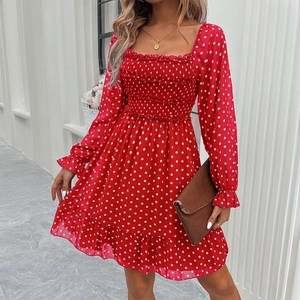 Elegant red long sleeve dress with white polka dots, square neck and ruffle hem