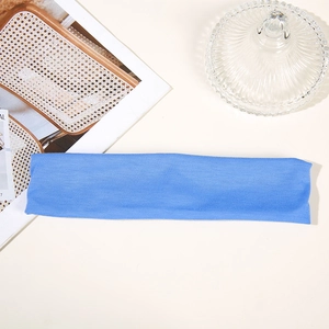 Close-up of blue fabric sports headband with a professional still life background