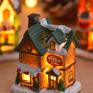 Christmas glowing resin ice cream house figurine with snow roof and warm LED lights