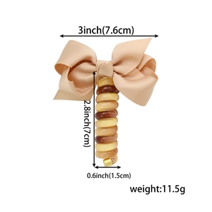 Cute beige bow hair tie with amber telephone wire spiral, 3 inch size and 11.5g weight