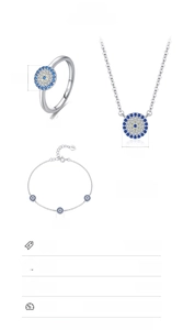 Macro detail of S925 sterling silver evil eye jewelry set with blue and white zircons