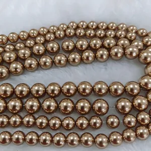 Perles de verre rondes dorées champagne sur fausse fourrure blanche pour bijoux DIY