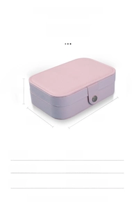 Pink jewelry box detail with premium PU leather exterior and soft pearl velvet lining