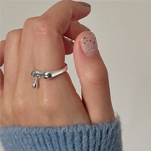 Minimalist S925 sterling silver water drop ring with a polished liquid metal texture