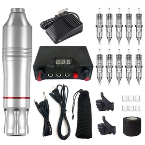 Complete tattoo kit with silver rotary pen power supply and needles on white background