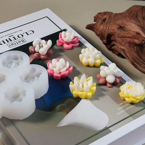 Detailed macro view of white silicone succulent molds with colorful resin flower crafts