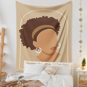 Detail of Bohemian tapestry with abstract female portrait on bedroom wall with string lights