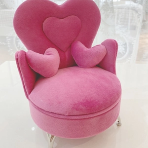 Pink heart-shaped velvet jewelry box in mini sofa design with gold metal legs