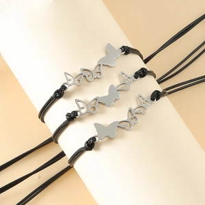 Ensemble de trois bracelets d'amitié tissés avec breloques papillon en acier inoxydable