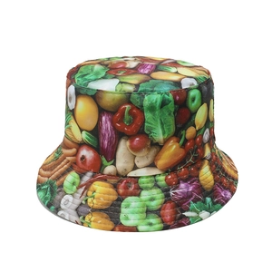 Close-up of vibrant vegetable and fruit print on a polyester summer bucket hat