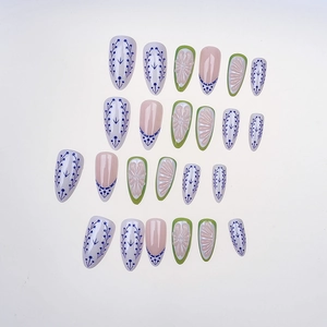 Floral almond press-on nails set with 3D embossed flowers and vintage blue vine patterns