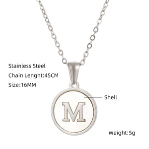 Detail view of silver stainless steel necklace with M letter shell pendant and specs