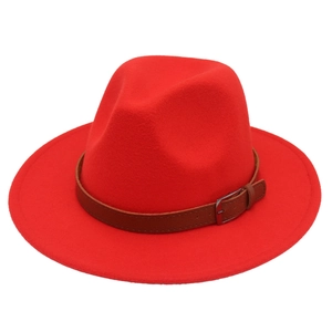 Detail of red wool felt fedora featuring a brown leather belt strap with metal buckle