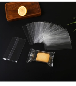 Macro shot of clear food-grade packaging bags featuring serrated edges and high transparency