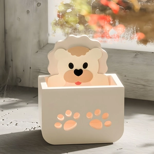 Cartoon lion storage box with hollow paw prints in warm white and orange resin