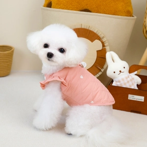 Detailed quilted pet vest in pink with heart embroidery and integrated D-ring for leash