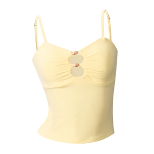 Detailed view of pale yellow camisole featuring front ruching and metal ring cutout detail