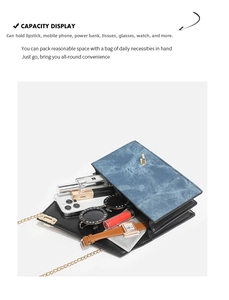 Detail showing the spacious interior of the blue denim chain bag with daily essentials