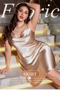 Detail of champagne gold silk satin slip nightdress with high luster and elegant drape