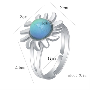 Detailed dimension guide for sun-shaped mood ring with thermochromic stone and size specs