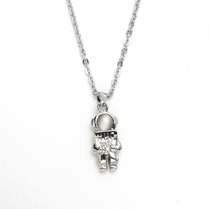 Titanium astronaut necklace with cat's eye stone and Hug Me engraving on pendant