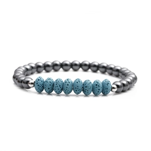 Detailed shot of beaded bracelet with blue lava stone, hematite beads and silver spacers