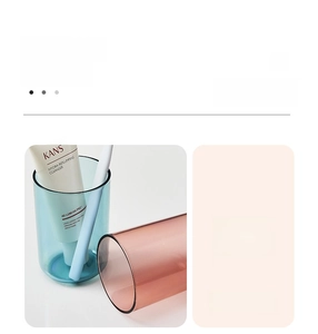 Detail of minimalist translucent blue and pink mouthwash cups with thick cup body design