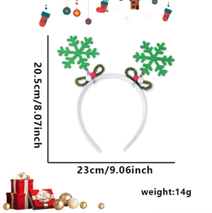 Detailed dimensions of the green snowflake Christmas headband with festive pom poms