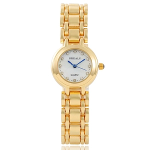 Detail of gold square quartz watch with crystal indices and blue hands on white dial