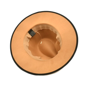 Detail shot of camel wool fedora hat featuring 65% cotton blend and inner sweatband