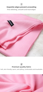 Detail of pink cashmere-like scarf showing smooth seams and anti-pilling textile texture
