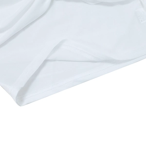 Macro shot of white mesh fabric texture and precise stitching on a sexy sheer crop top