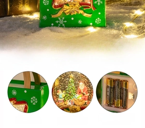 Detailed view of Christmas water globe interior with Santa Claus and resin snow scene