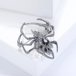 Polished metal spider brooch with black gemstone for men's creative suit accessories