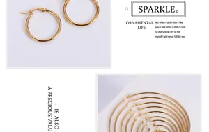 Polished gold titanium steel hoop earrings set in various sizes with snap closure detail