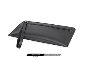 Detailed bottom view of large capacity black leather clutch with lychee texture
