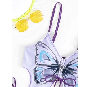 Detailed view of purple bikini with butterfly print, drawstring detail and summer accessories