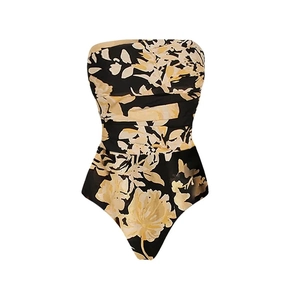 Detailed view of strapless one-piece swimsuit with floral print and waist ruching