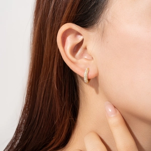 S925 Sterling silver hoop earrings with multicolored zircons on model's ear
