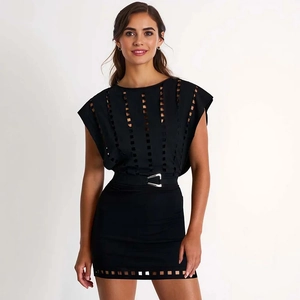 Detail of sexy black cutout dress with vertical hollow design and silver buckled belt